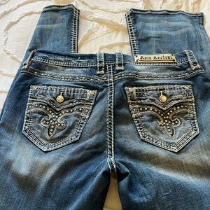 Rock Revival Women's Blue Wash Boot Cut Jeans with Embellished Back Pockets